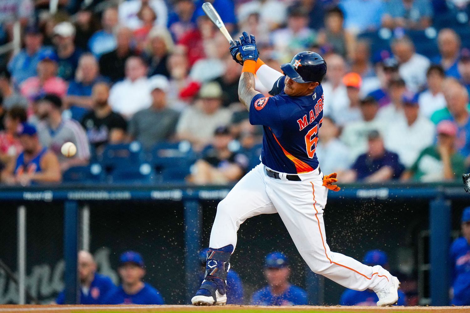 Mar 7, 2023; West Palm Beach, Florida, USA; Houston Astros right fielder Bligh Madris (66) hits a single against the New York Mets during the first inning at The Ballpark of the Palm Beaches. Mandatory Credit: Rich Storry-USA TODAY Sports